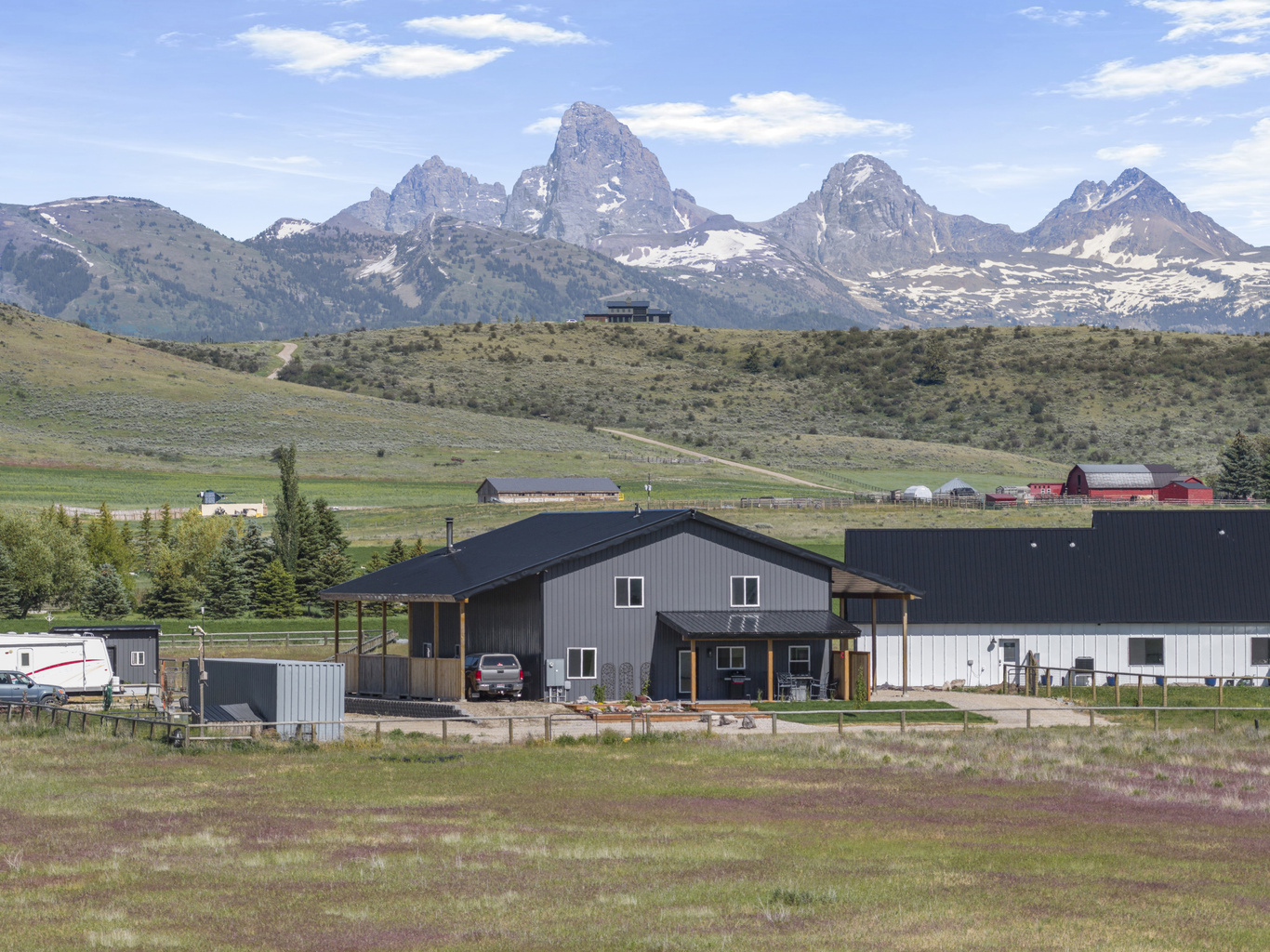 Exterior of home with breathtaking views of the Teton Mountain Range.