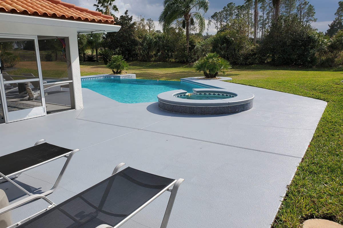 Patio and pool deck, spa and infinity edge pool