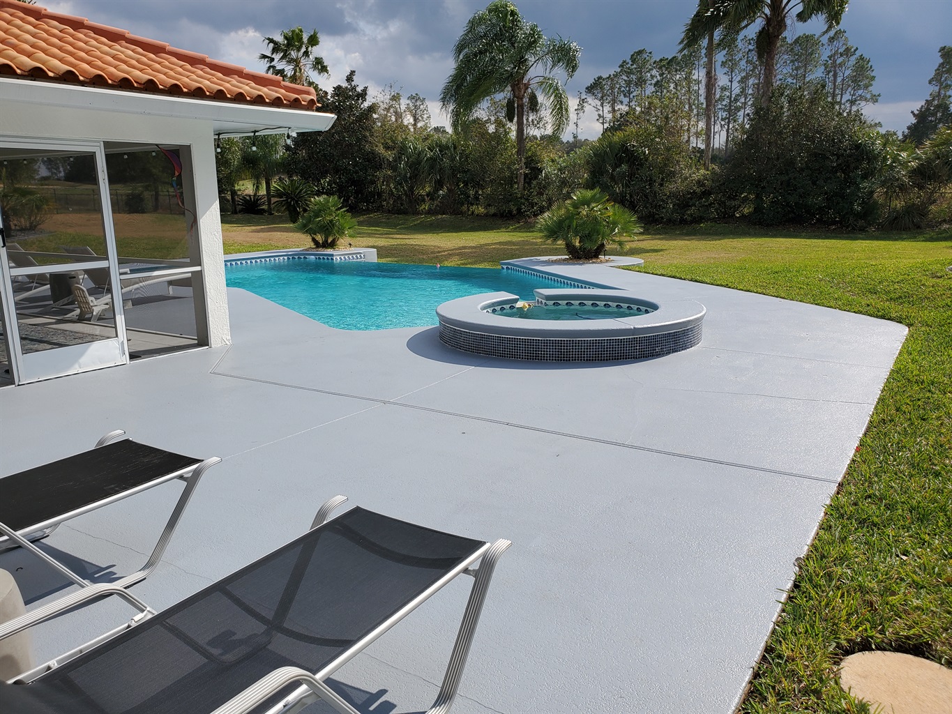 Patio and pool deck, spa and infinity edge pool