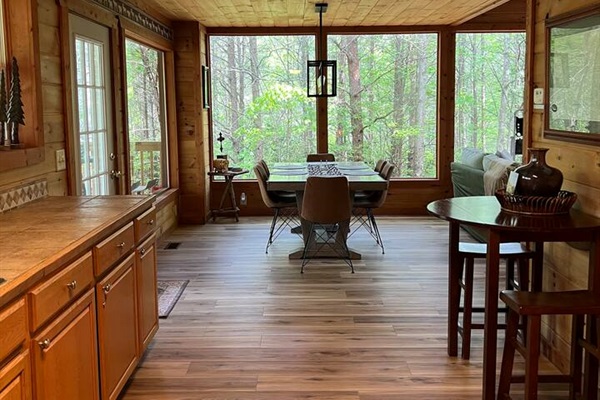 "This Open Floor Plan Connects Creates a Warm Inviting Space Perfect for Gathering"