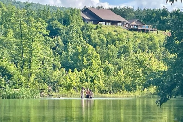 Kids playing in the Little River (guest photo June 2025).