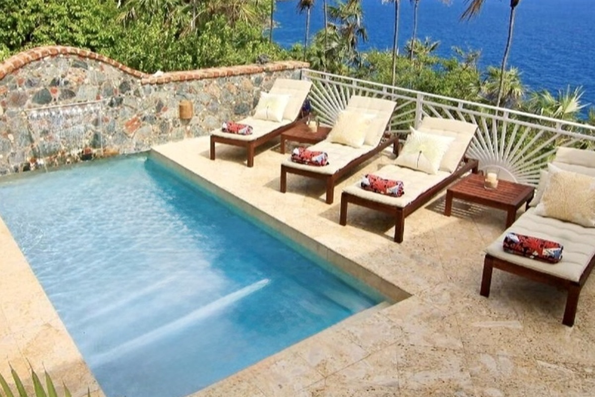 Private Pool Private pool with loungers and waterfall feature—your own sunny retreat.