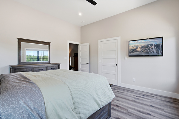 A spacious, relaxing bedroom offers plenty of room to settle in and feel at home.