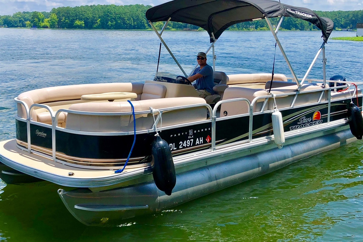 Guest enjoying a pontoon boat on Lake Gaston