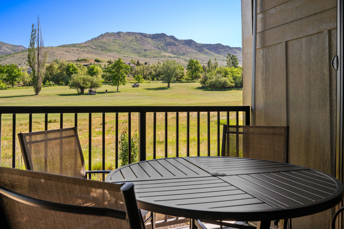 Private covered deck overlooking Wolf Creek Golf Course and surrounding mountains.