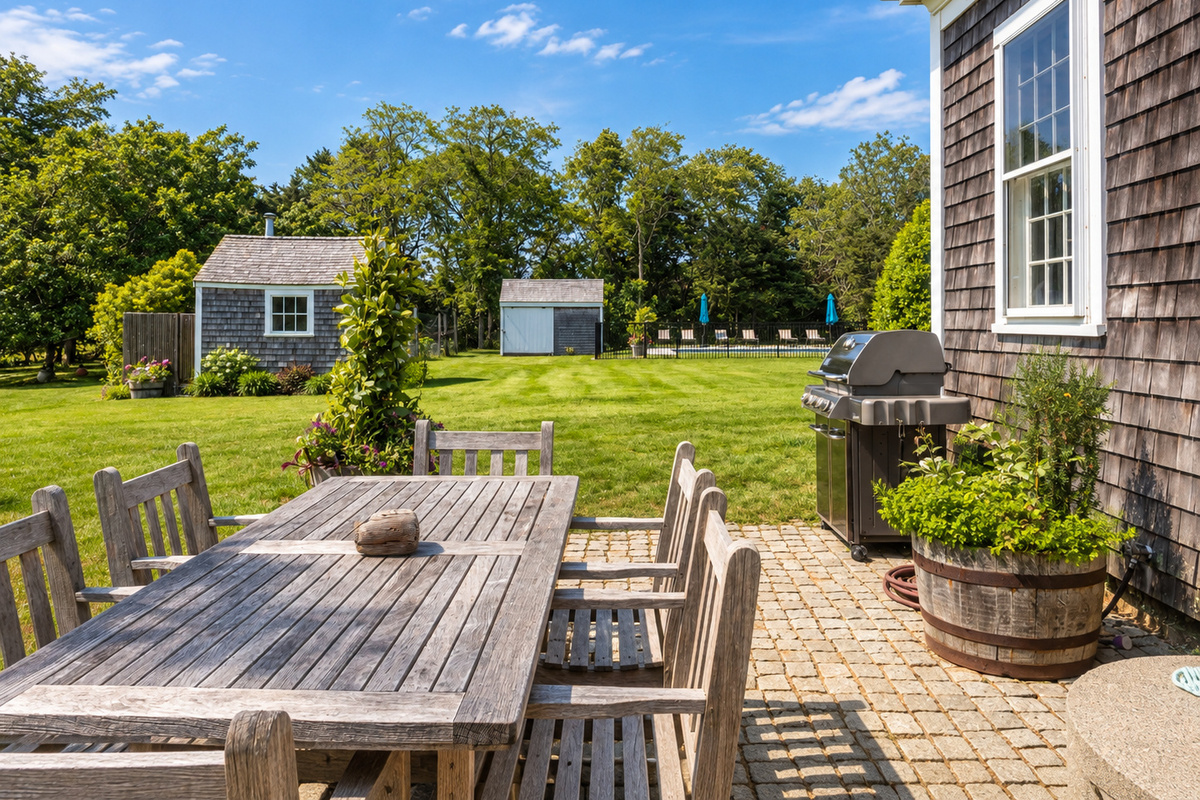 Outdoor dining table and grill