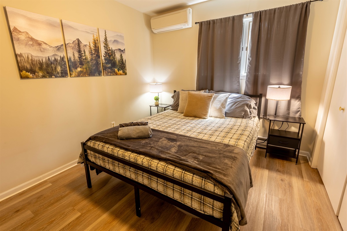 Cozy up in our queen bedroom for a dreamy night's sleep