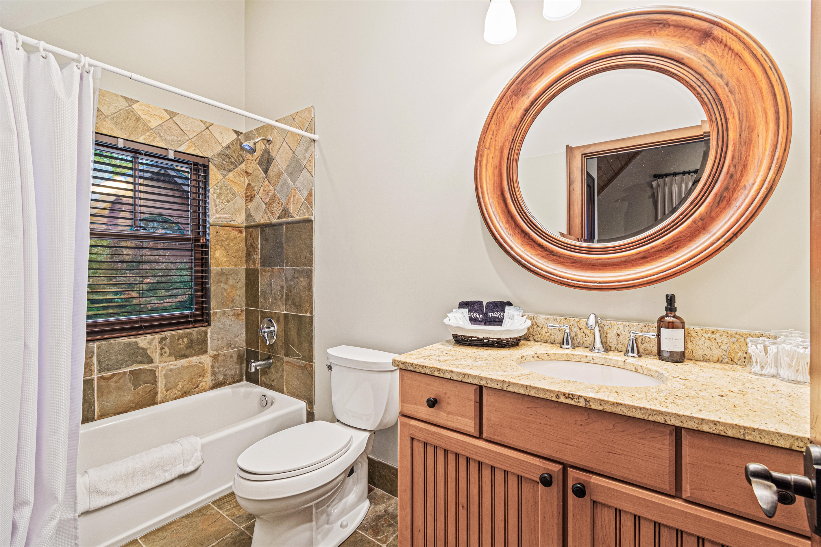 Guest House: Full ensuite with shower/tub combo.