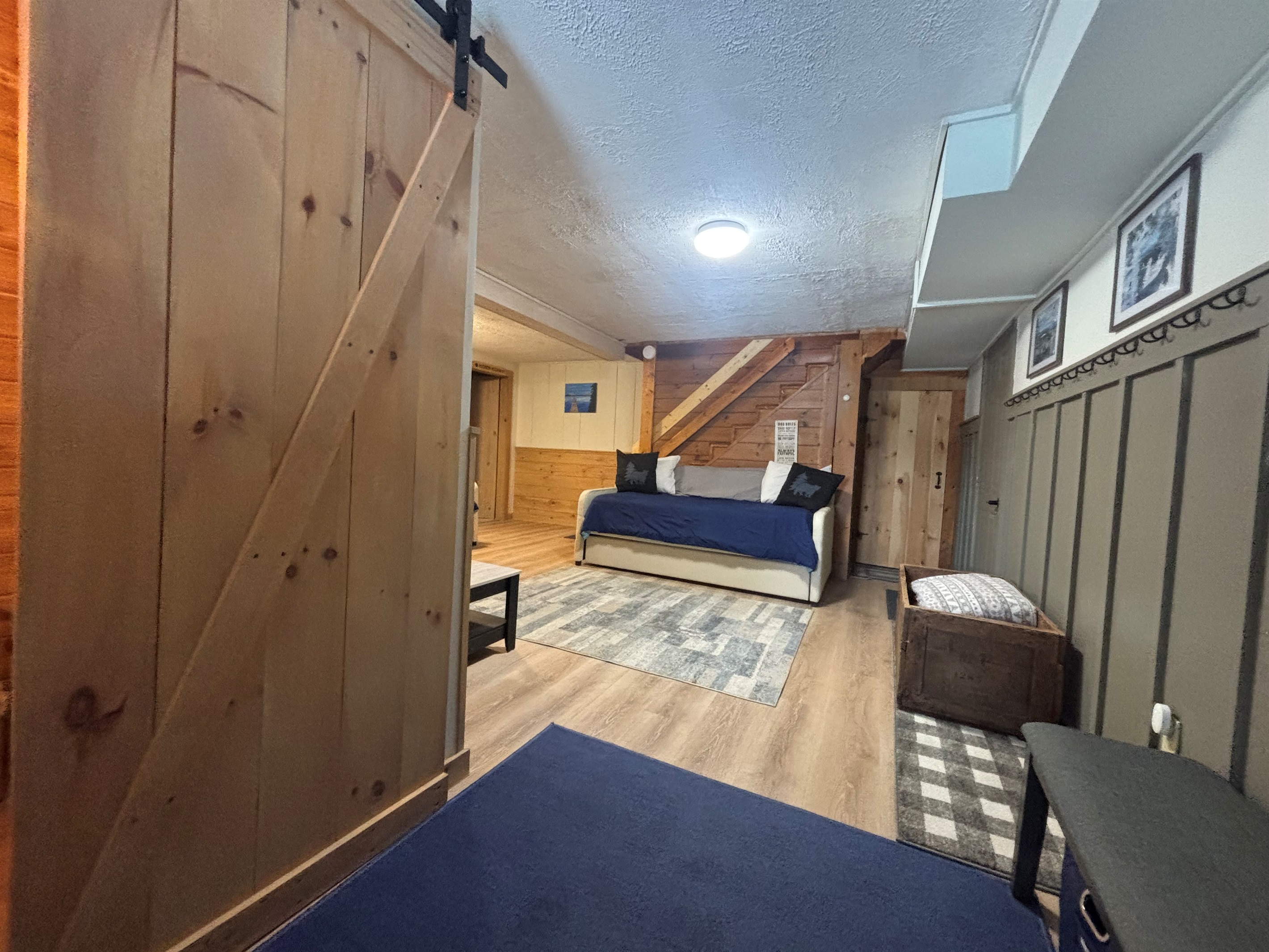 Half bathroom as you enter basement on the left