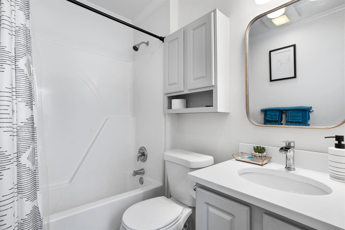 Full bathroom stocked with all essential items and towels. 