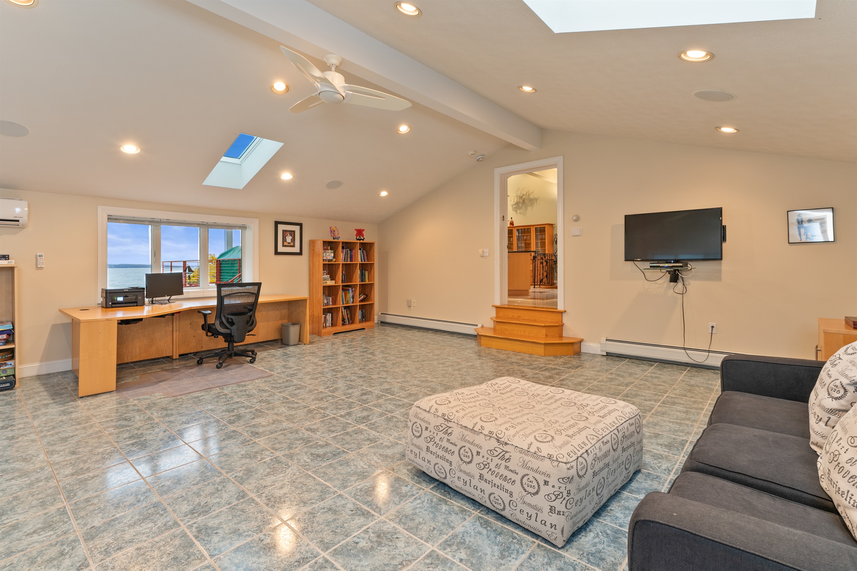 Designated desk area with separate living room space-main floor