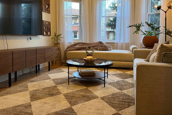 Large living space with stylish decor and relaxing atmosphere.