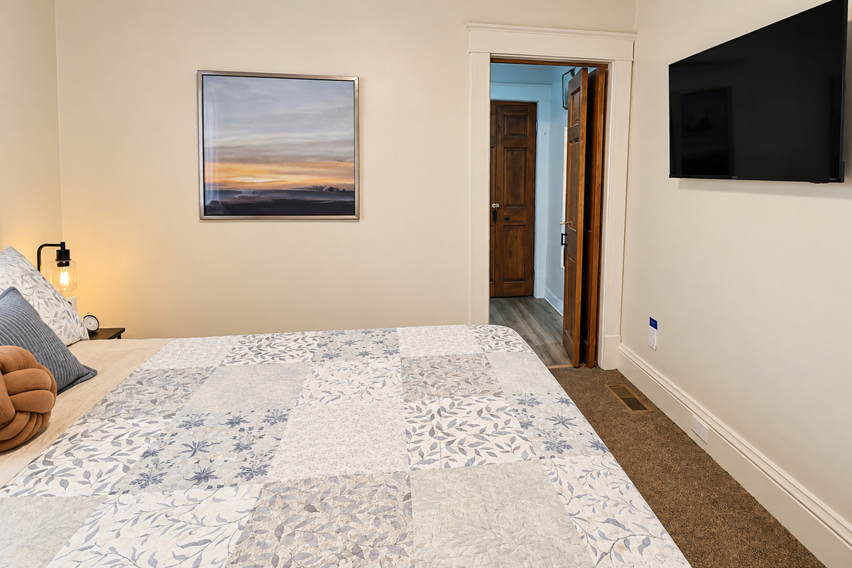 Queen bedroom with Smart TV—perfect for winding down after a busy day.
