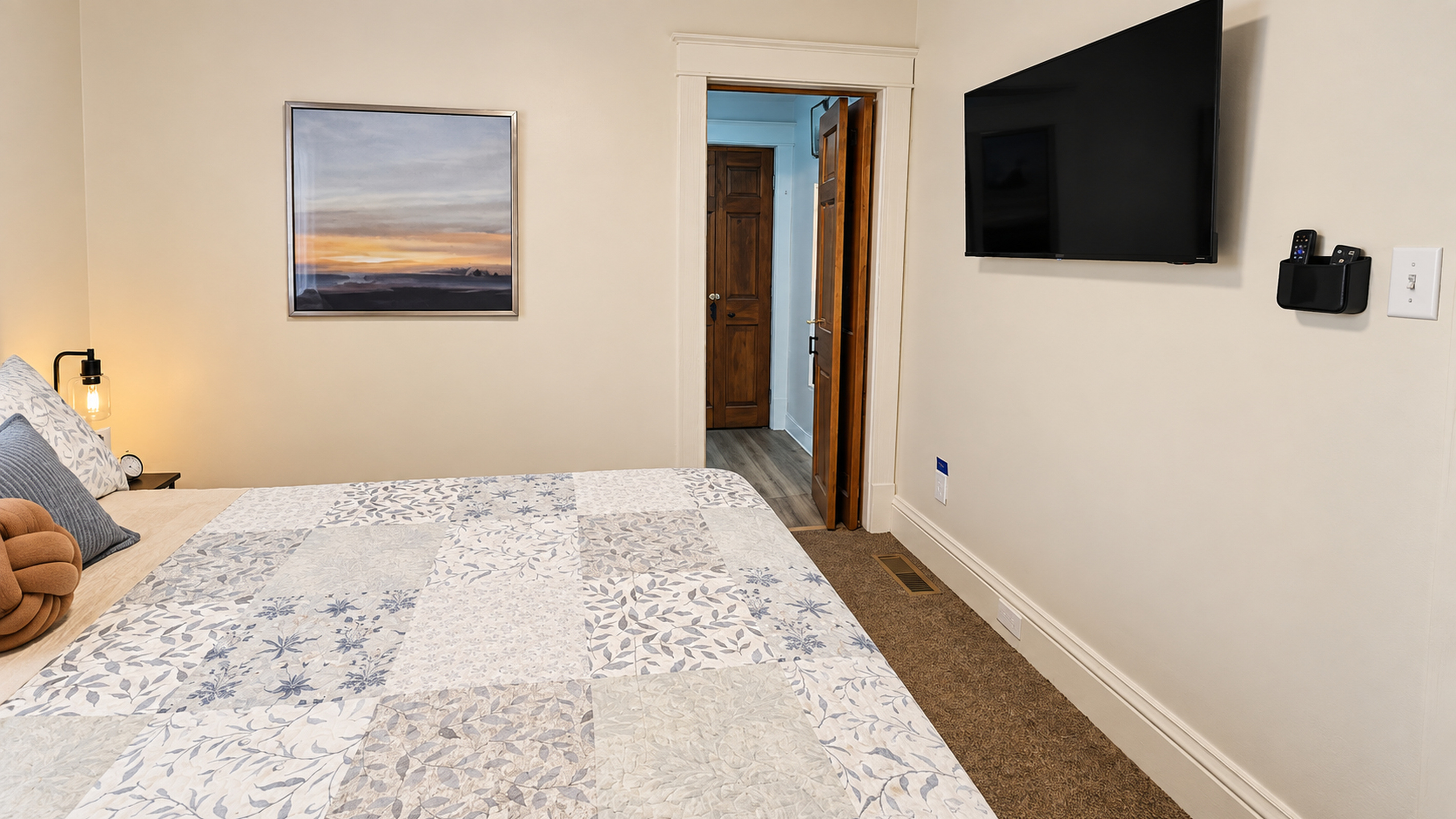 Queen bedroom with Smart TV—perfect for winding down after a busy day.