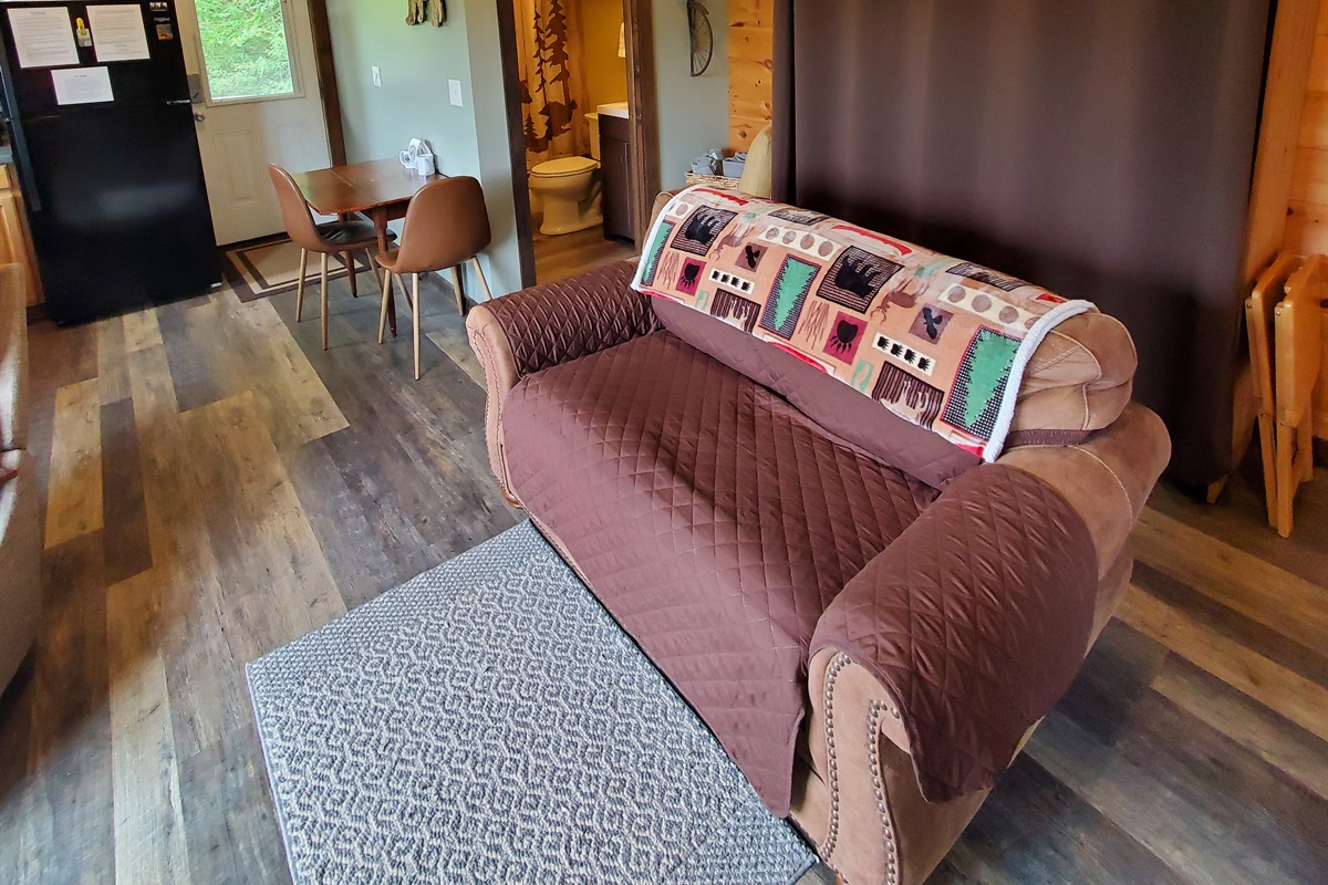 Living room loveseat, Queen murphy bed behind loveseat