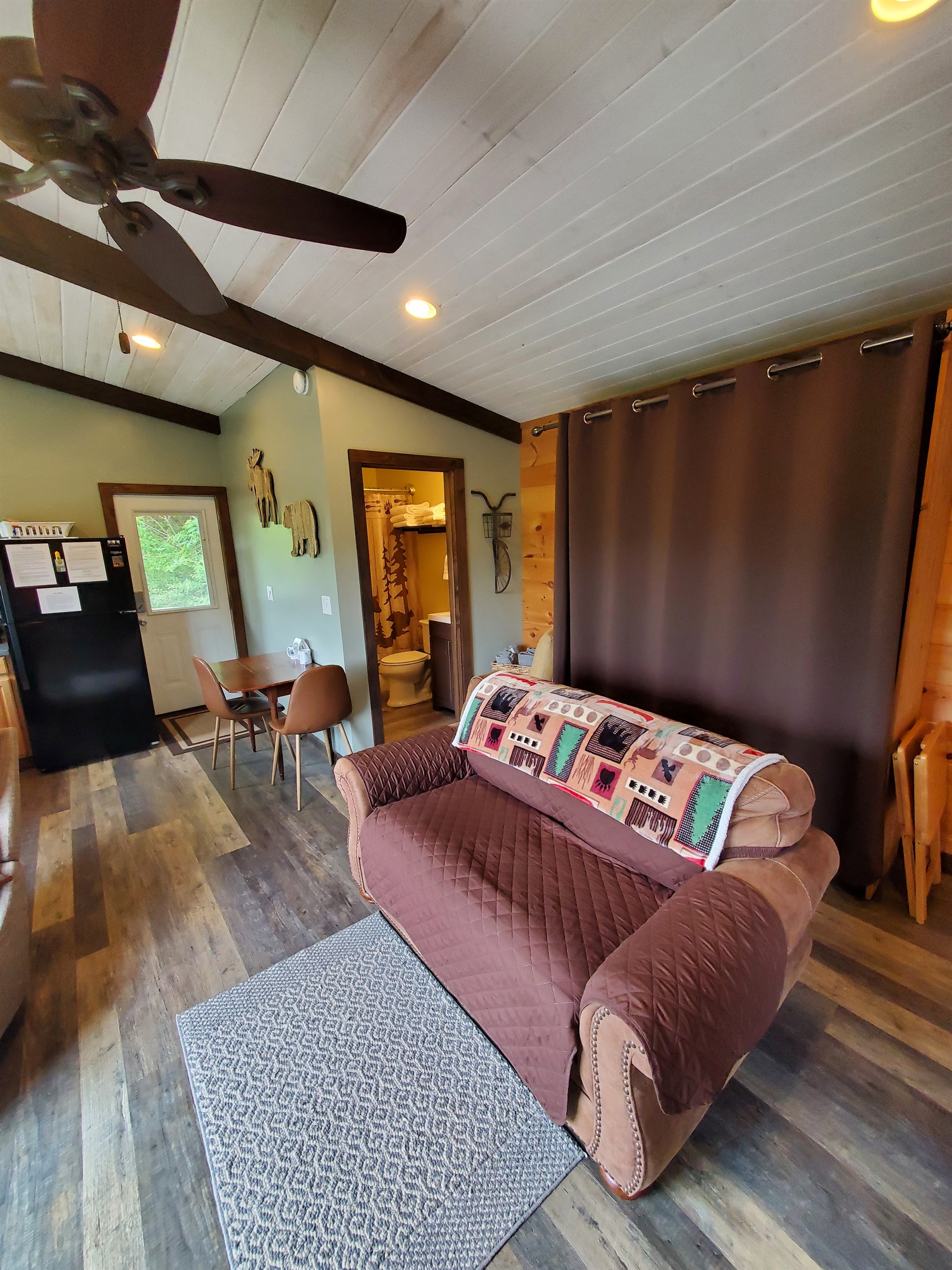 Living room loveseat, Queen murphy bed behind loveseat