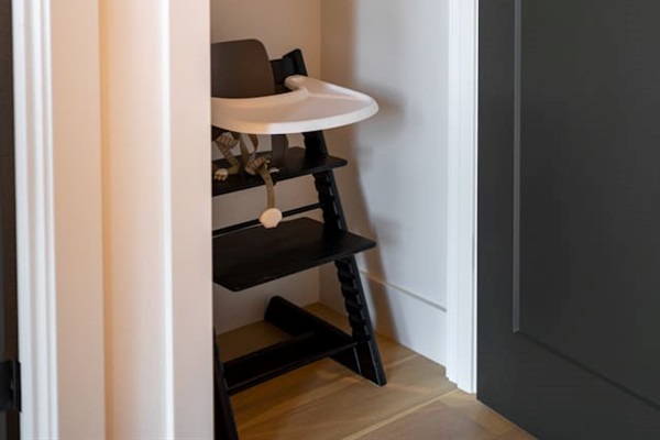This is the closet on the main floor, where we’ve prepared a Stokke high chair for your little one!






