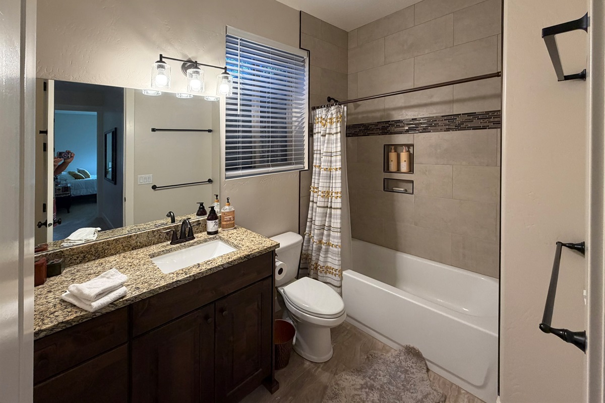 Beautiful downstairs bathroom conveniently located near the guest bedrooms.