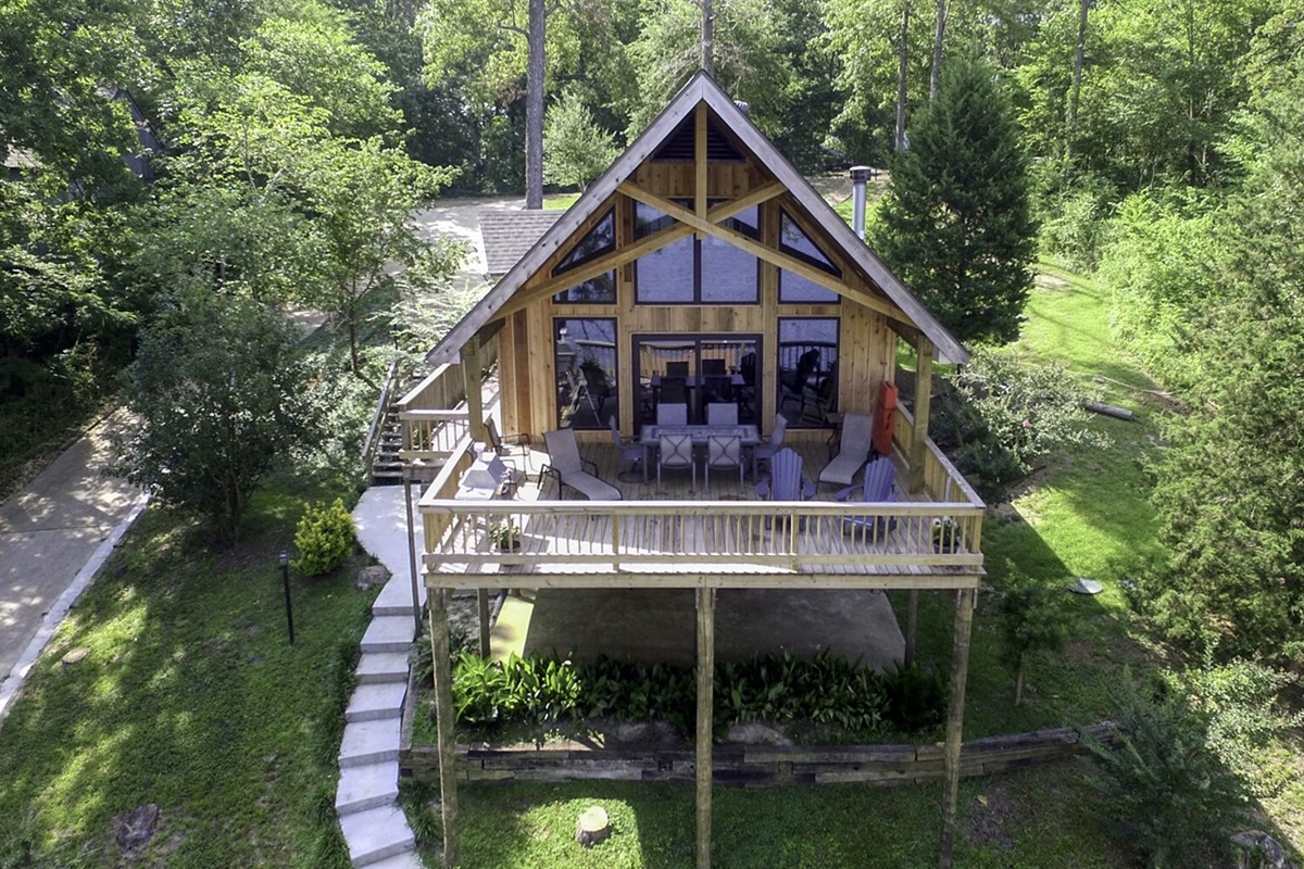 Drone view of The Y-Knott Lodge from over the boat house