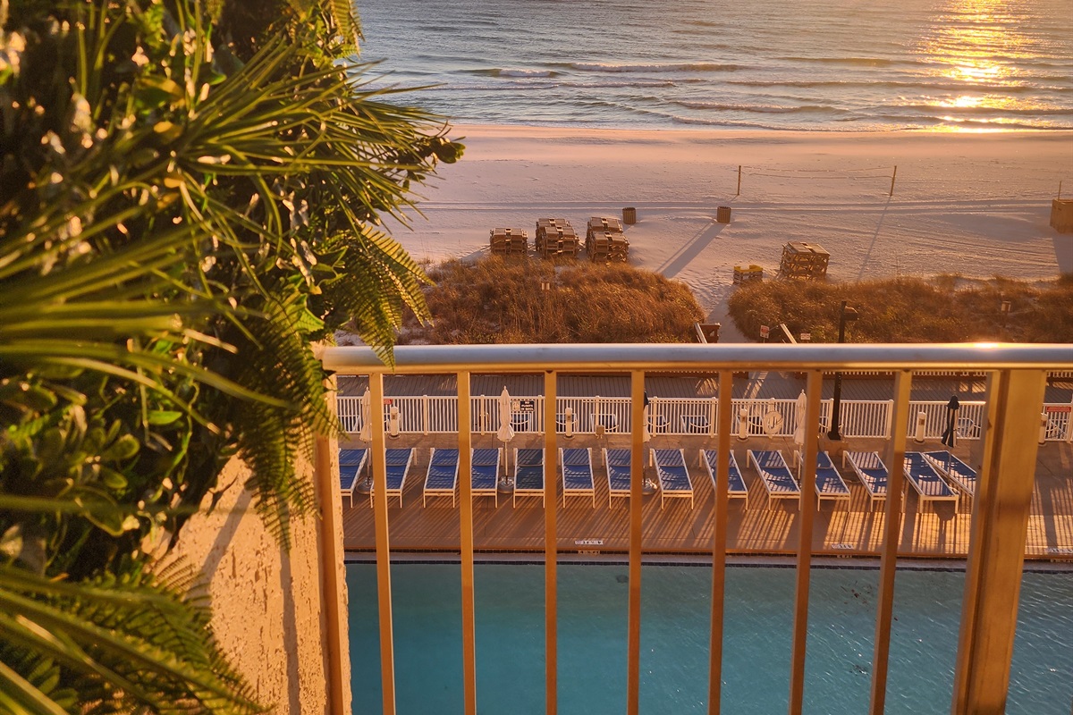 Stunning sunsets from your balcony with tropical decor for a Coastal Breeze vibe