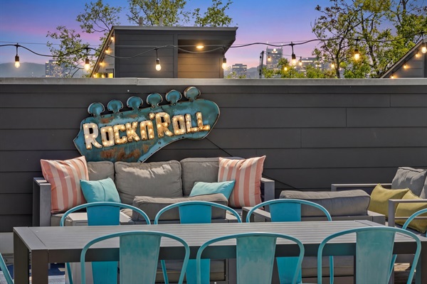 Rooftop Retreat: Lounge under the stars with stunning views and vibrant decor!