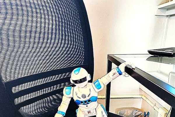 Howie SHOG presents the desk area.