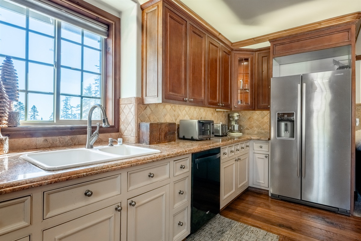 The Retreat's well-equipped, light filled kitchen includes an espresso machine, gas cooktop, electric oven, and plenty of space to start the day right.