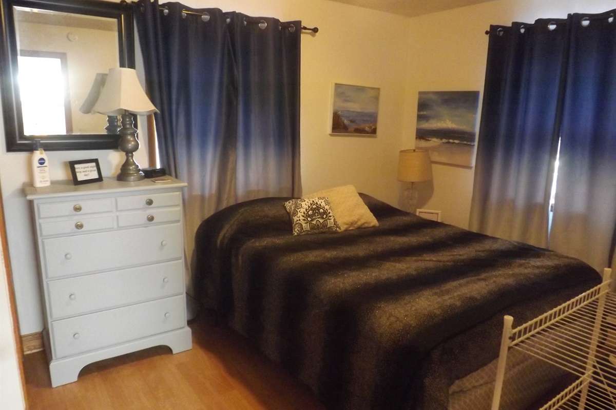 Queen bed with Roku smart TV