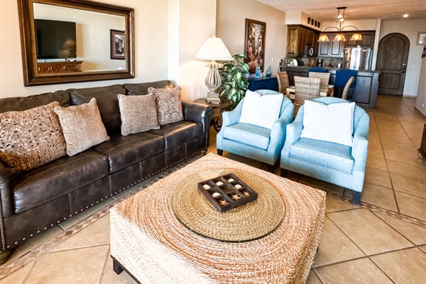 Comfortable living space with sofa bed, Smart TV, and ocean views.