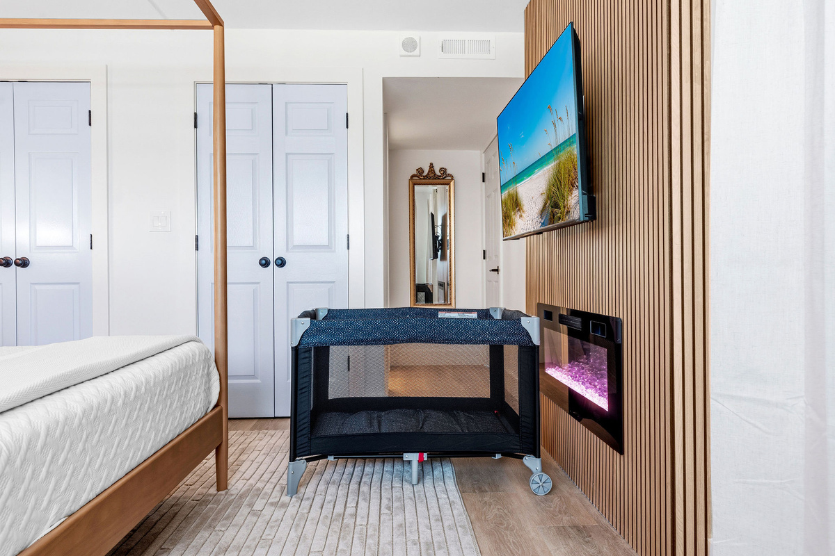 Pack and play and high chair are stowed away in the master closet. Change the fireplace colors to match your mood while you watch a movie.