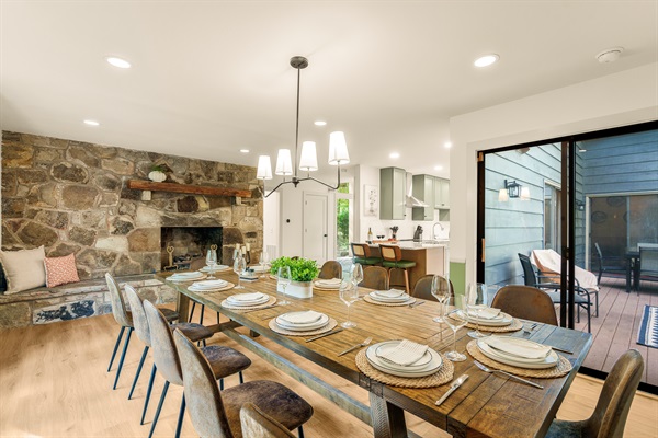Extra large dining area directly connected to the kitchen and the deck (where grill is). 