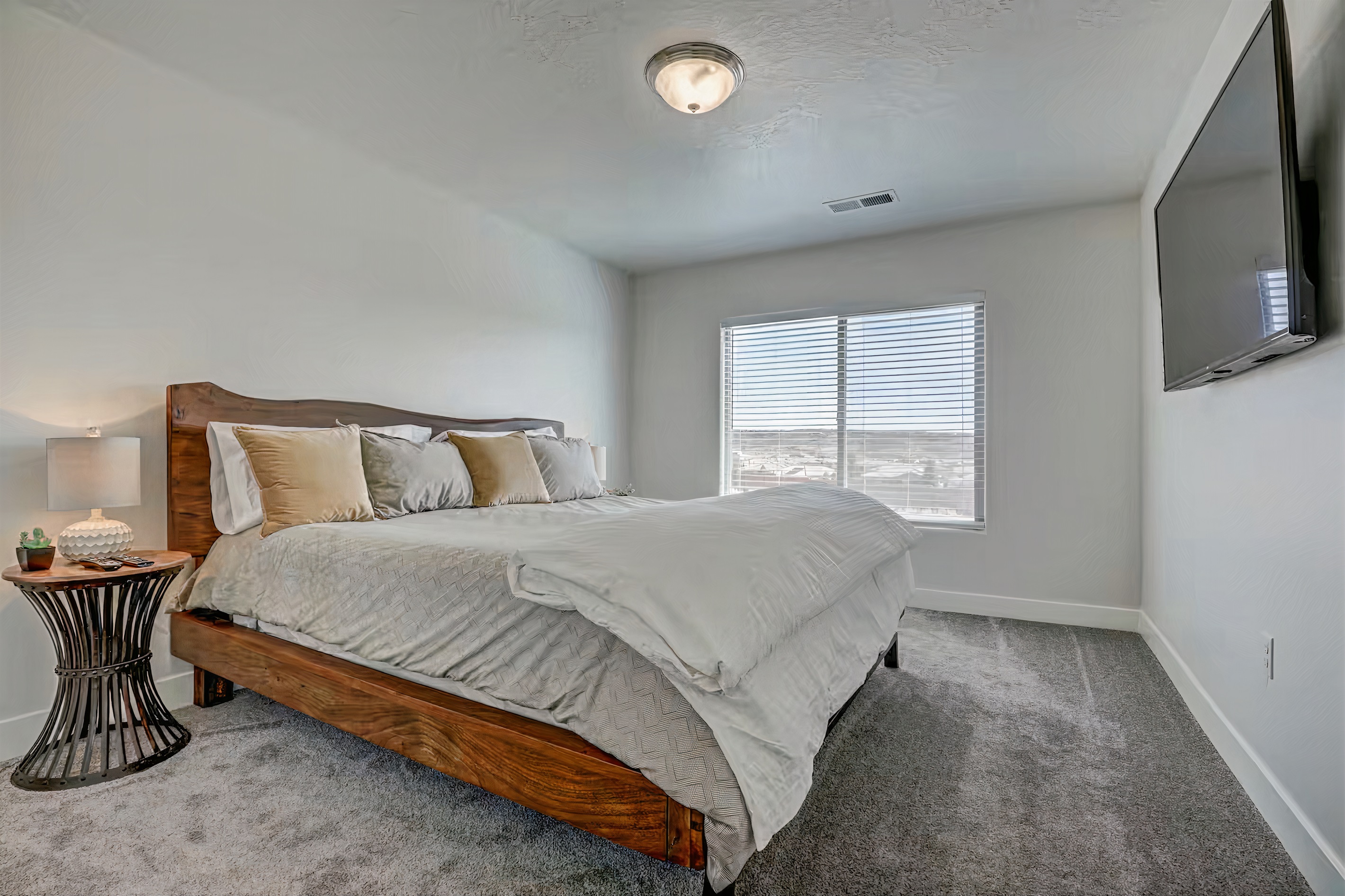 King bed with Smart TV and breathtaking views from window.