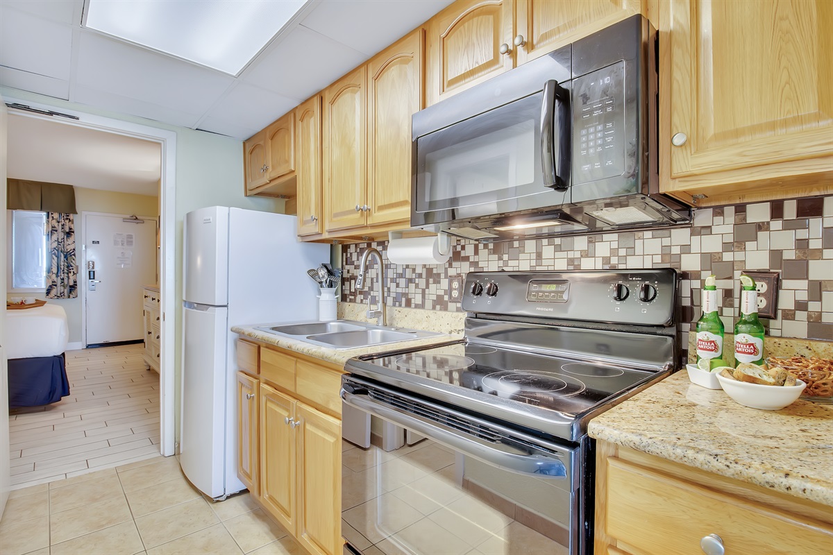 Bright and functional kitchen perfect for cooking after a day at the beach