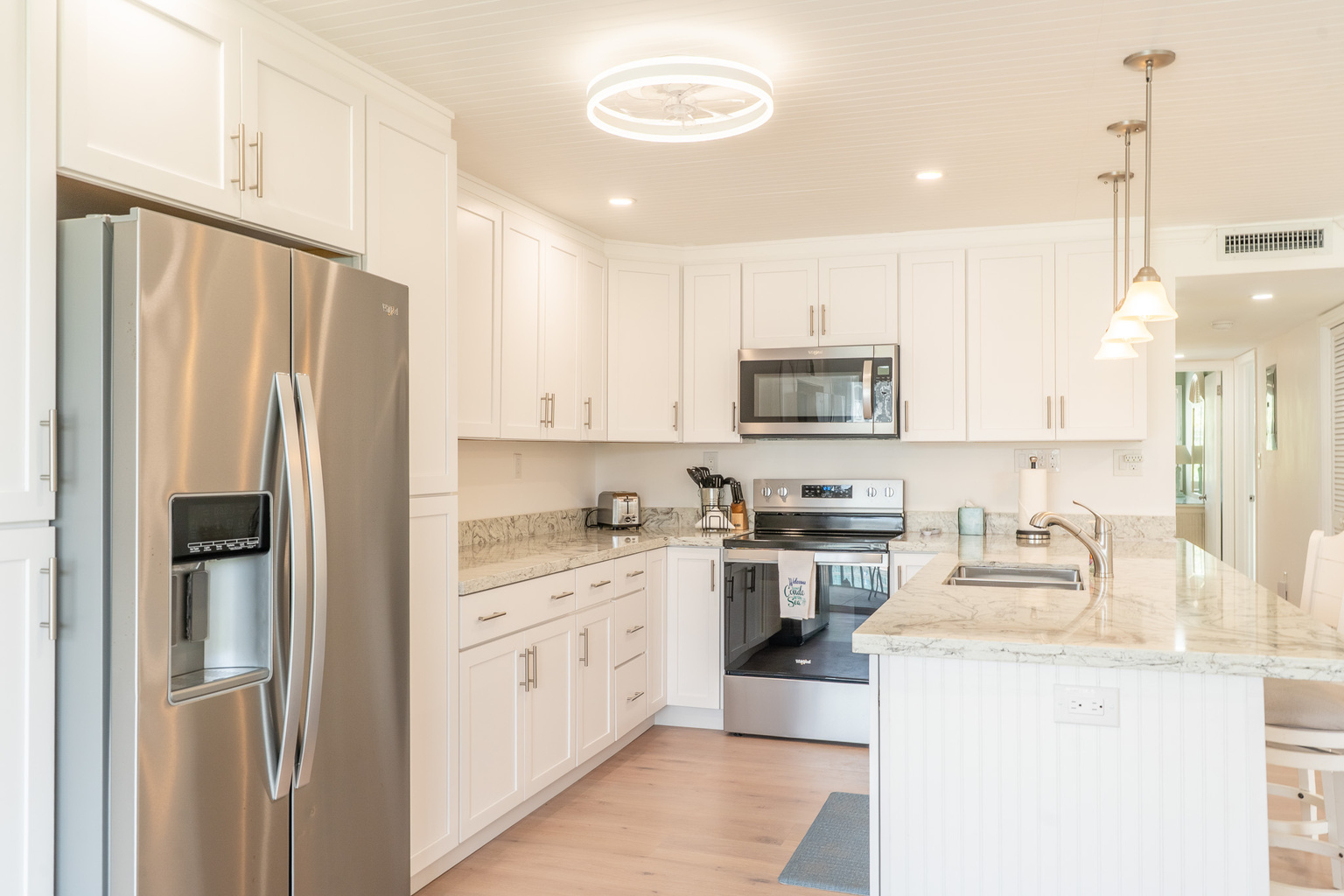 Newly renovated kitchen with granite countertops.  Fully stocked kitchen.