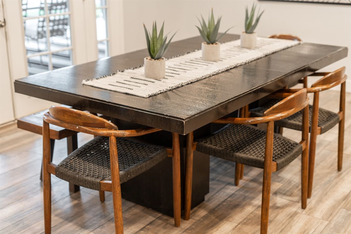 Modern 6-seater dining table, offering ample space for family meals and entertaining.