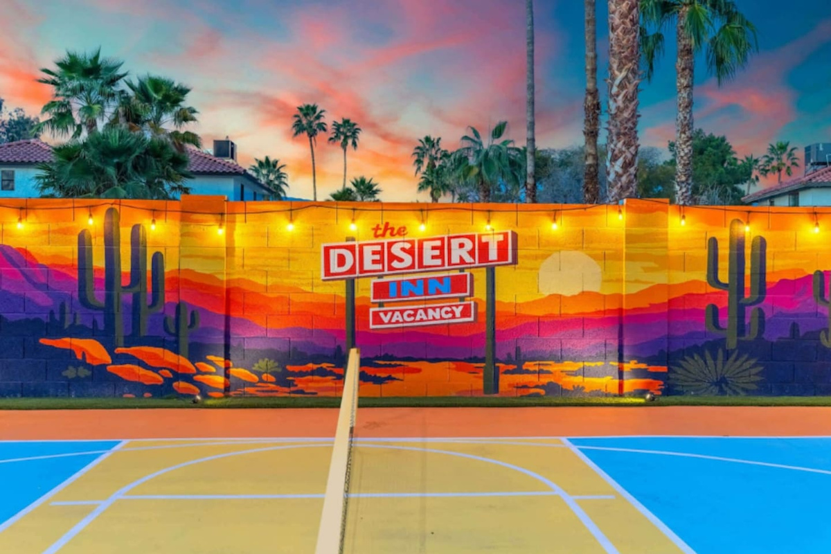 Custom mural makes for the perfect backdrop for capturing photos to remember your vacation!