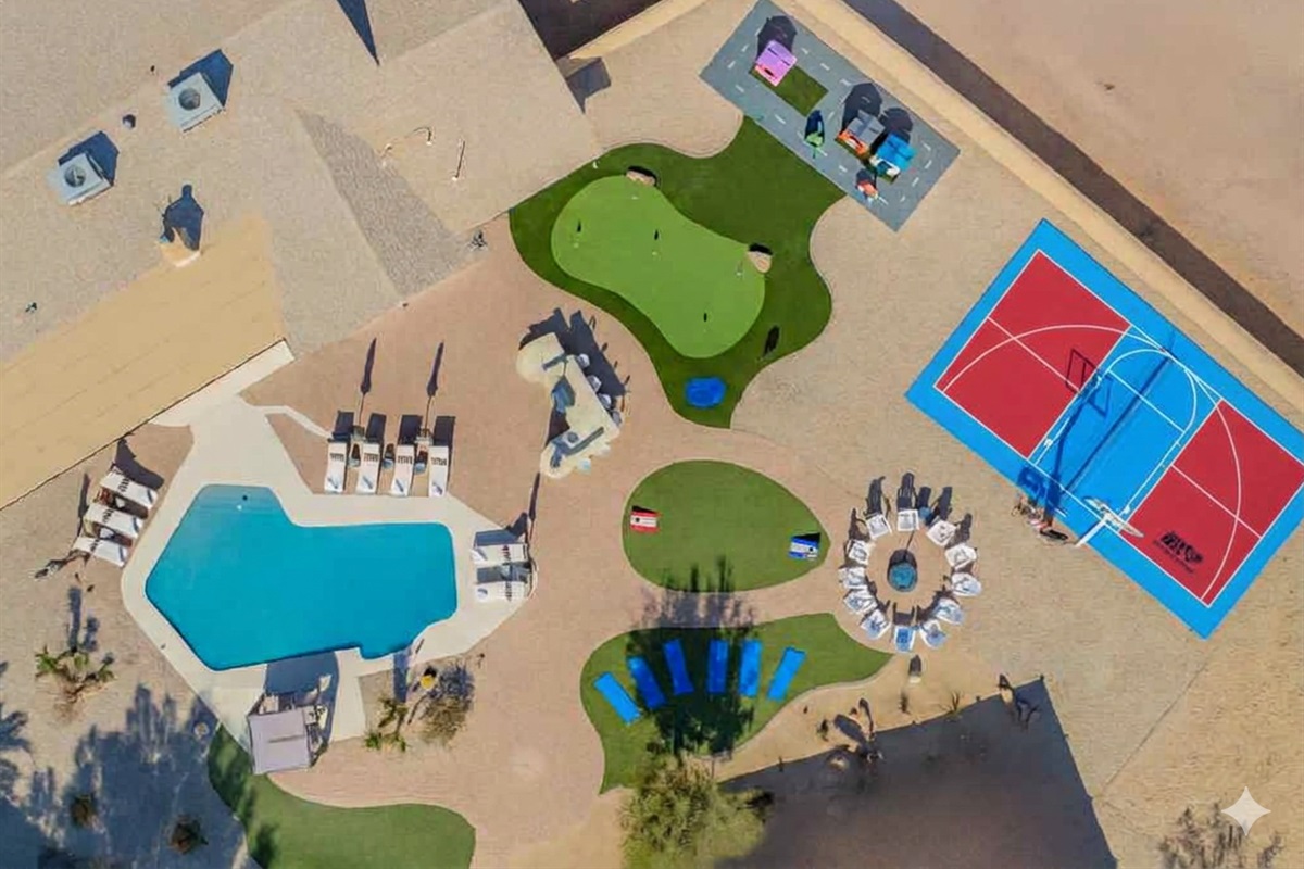 Aerial view of the entire backyard resort — pool, mini golf, sports courts, and lounge areas.