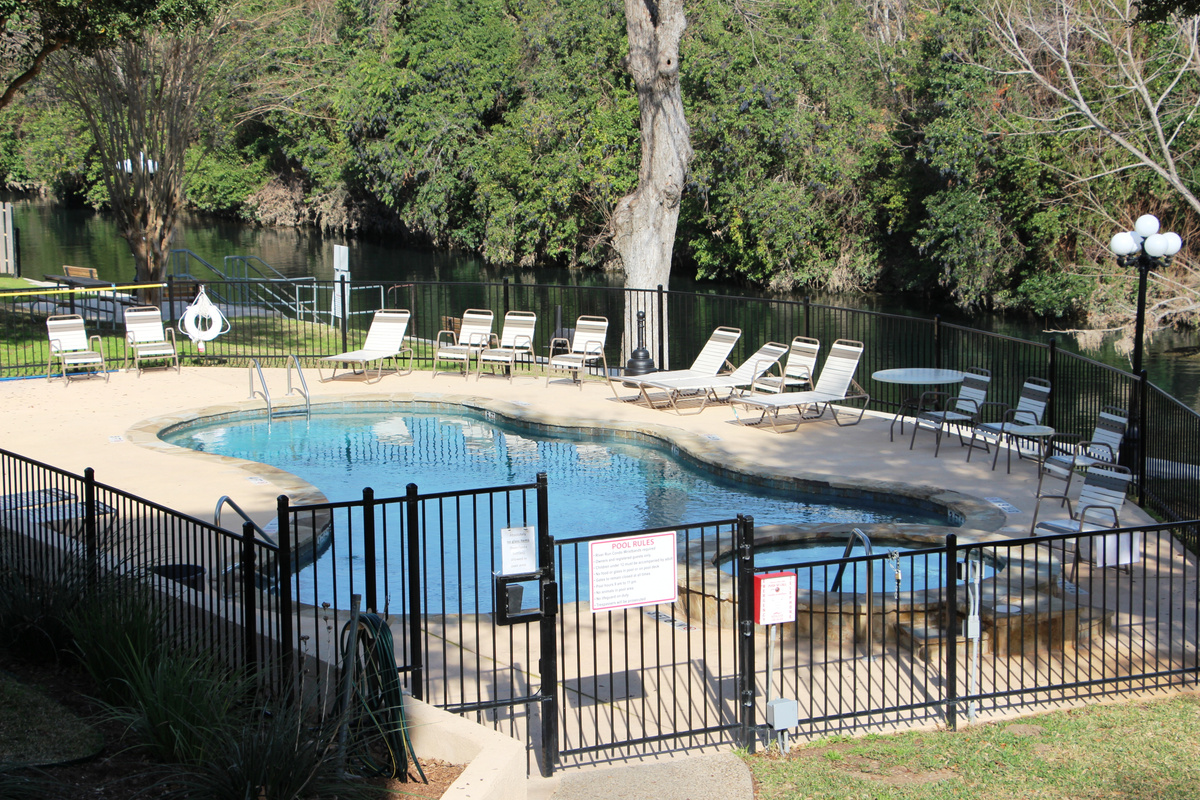 Pool overlooks the Comal River