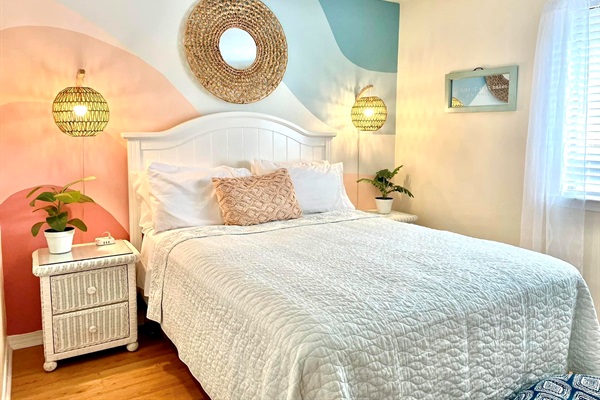 Our second bedroom is light and airy and perfect for adults or kiddos!