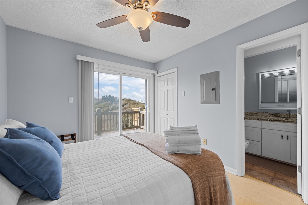 Wake up to natural light and dune views, with direct access to the deck from the master bedroom
