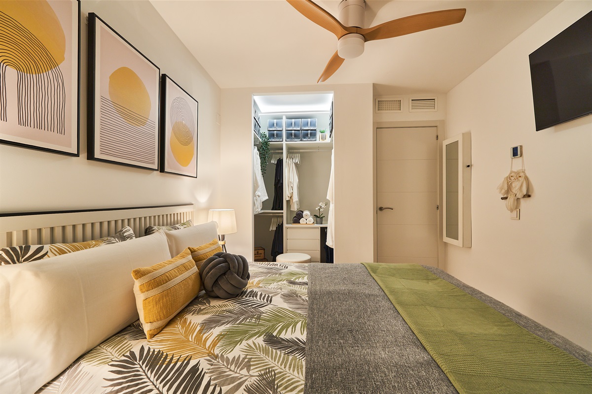 Bright and elegant master bedroom with a private terrace, walk-in wardrobe, and a serene atmosphere designed for restful nights.