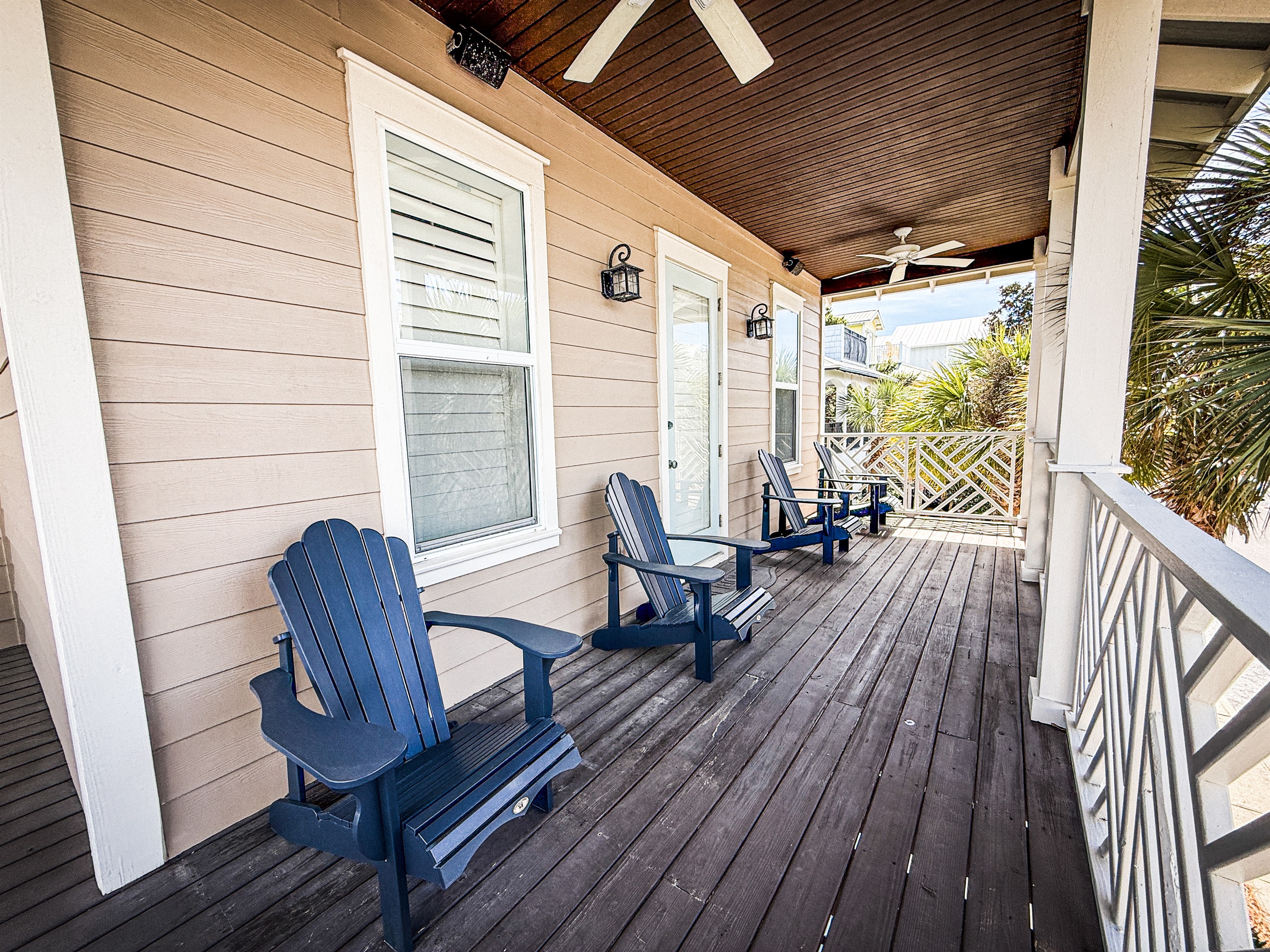 Spacious second-floor balcony with comfortable seating, perfect for morning coffee or evening unwinding.
