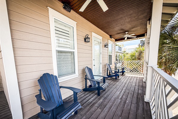 Spacious second-floor balcony with comfortable seating, perfect for morning coffee or evening unwinding.