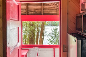 Screened porch point of view from inside of the cabin
