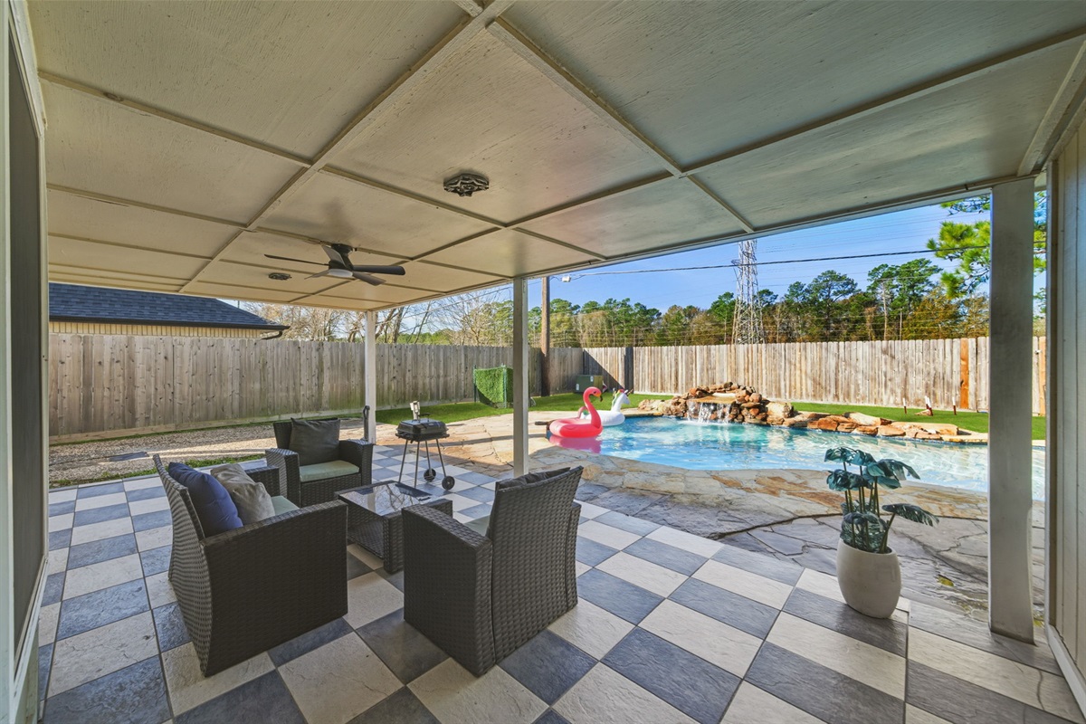 Spacious backyard patio designed for gathering and conversation.