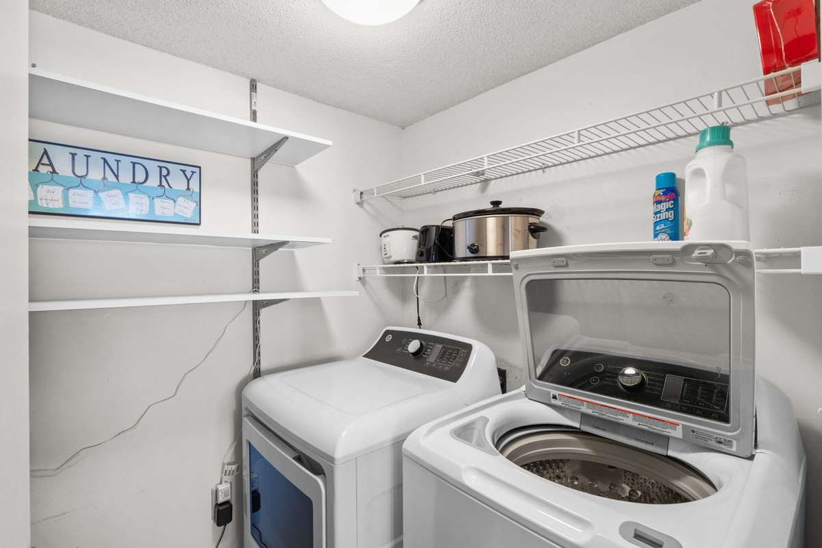 Laundry room with full size washer and dryer