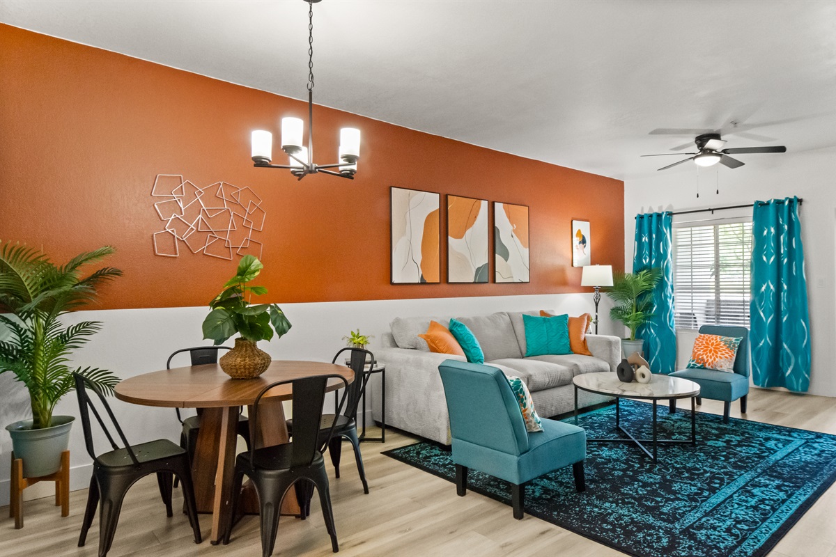 🏡 Make yourself at home in this cozy and welcoming living room and dining.