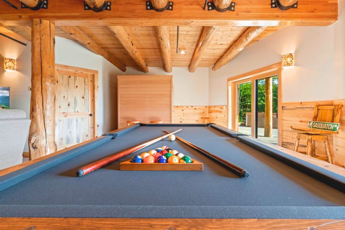 Relax, play, and enjoy the pool table area.