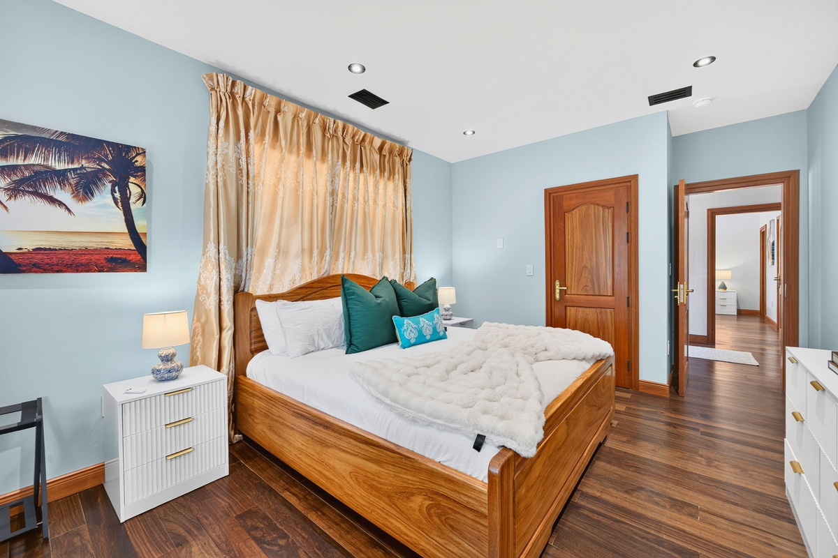 1st Floor Bedroom 2, King Suite | Rosewood Retreat | 2605 Palm Blvd, Isle of Palms, SC | IOP Escapes