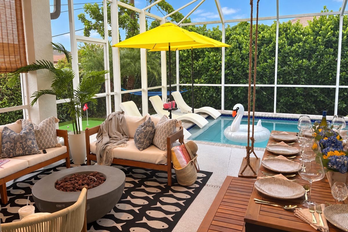 Step into your private resort. This large, screened lanai features a sparkling pool and a cozy fire table for the whole group. Experience true al fresco living at the 10-seat dining table, complete with playful swings that let you sway into paradise.